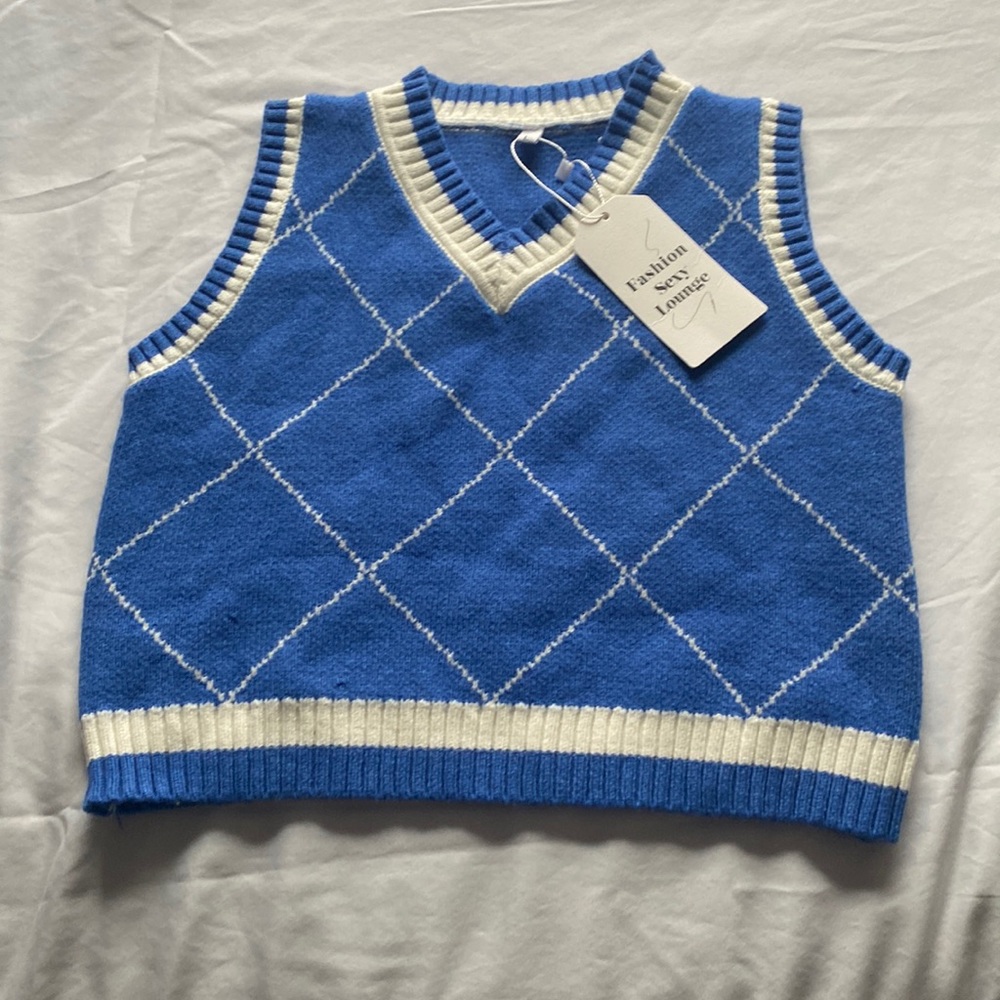 Argyle sweater vest, color- blue/white size- L but runs S/M